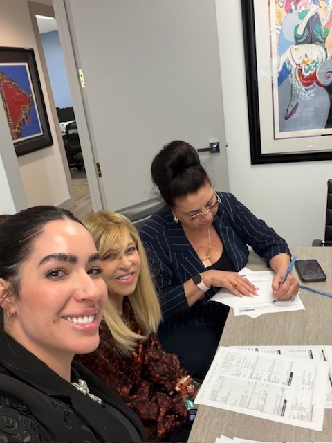 A real estate closing at American Dream Title Company
